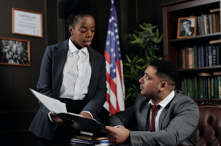 man and woman in suit talking